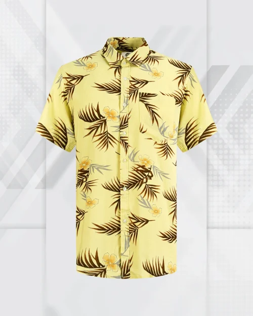 Designed with a comfortable relaxed-fit and a classic camp collar, this shirt is breathable and perfect for warm weather. It’s an ideal choice for beach days, resort wear, or vacation settings.