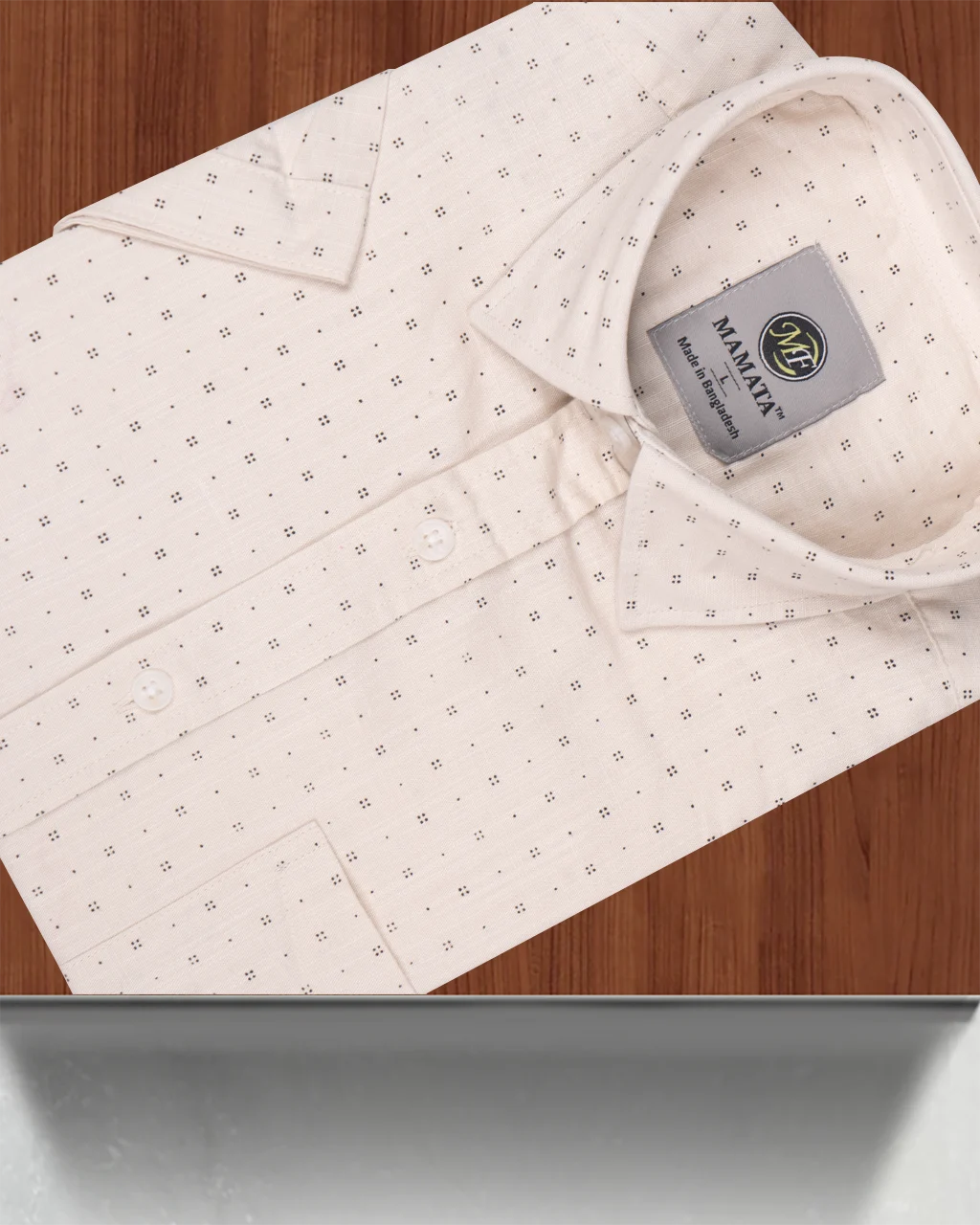 This off-white half-sleeve button-down shirt is designed for the modern individual who values a relaxed yet smart style.